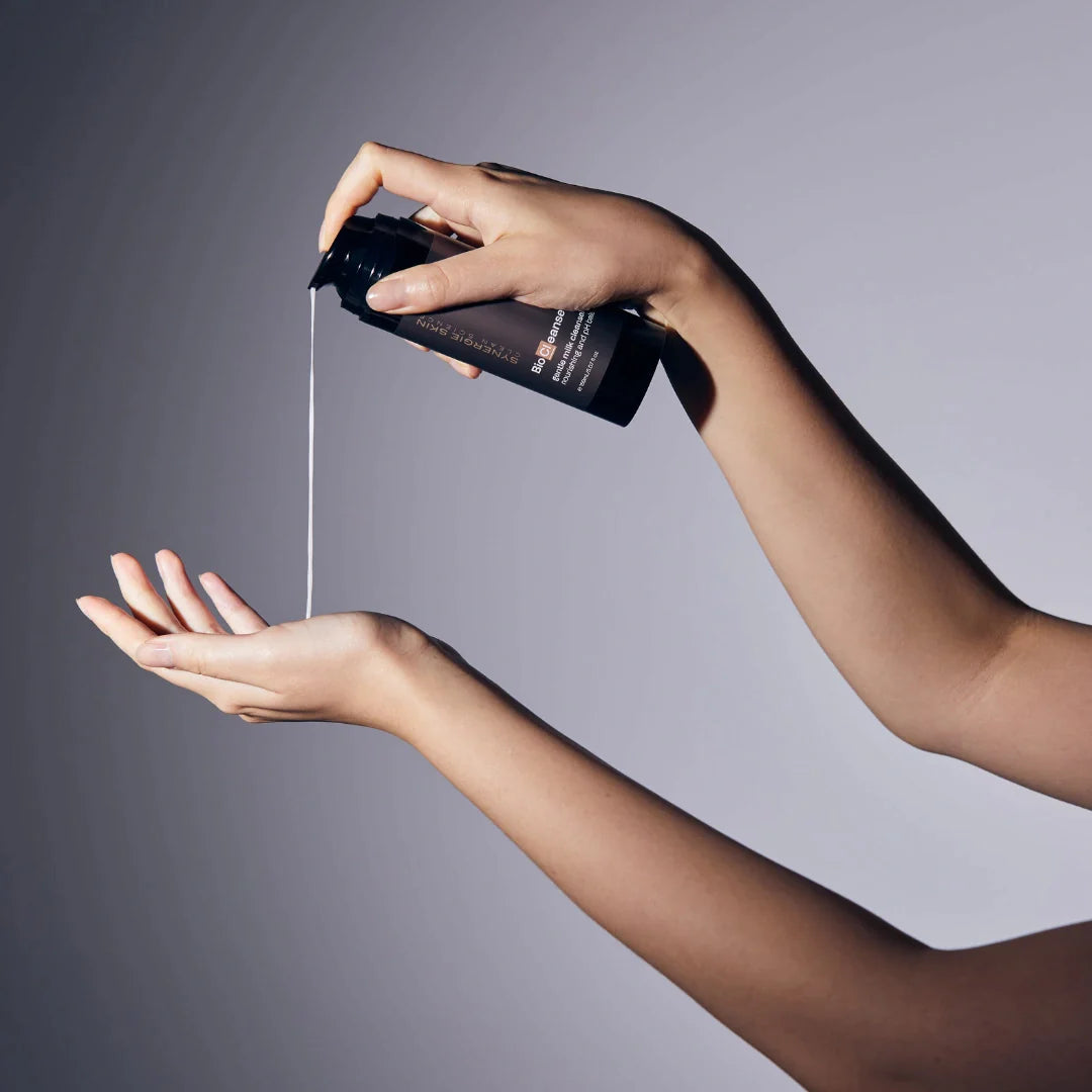 Skincare model pumping Synergie Skin's UltraCleanse in to hand